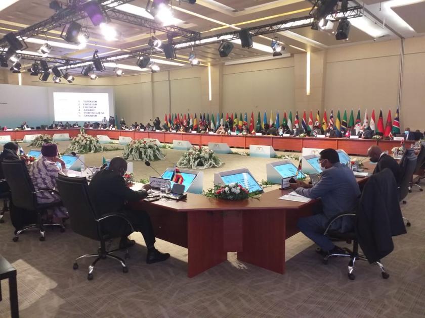 AU